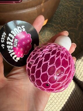 Mesh Squeezeballs Squishy Fidget Toy- Five Below- Pink w/ Black inside (NWT)